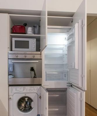 提高套房利用空间的冰箱摆放技巧（合理利用空间）